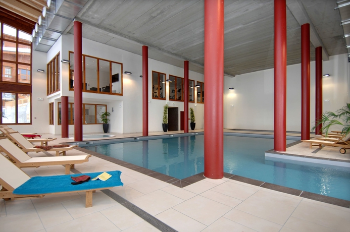 Imagen de la piscina del Hotel Résidence Prestige Odalys Edenarc - Arc 1800. Foto 18