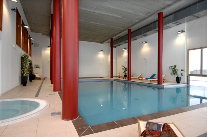 Imagen de la piscina del Hotel Résidence Prestige Odalys Edenarc - Arc 1800. Foto 19
