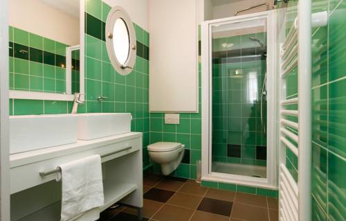 Imagen de la habitación del Hotel Résidence Prestige Odalys Le Château De Kergonano. Foto 4