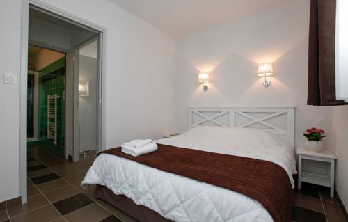 Imagen de la habitación del Hotel Résidence Prestige Odalys Le Château De Kergonano. Foto 6