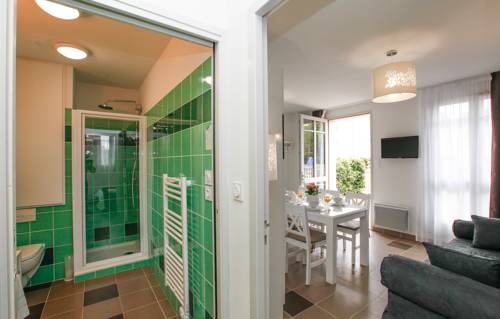 Imagen de la habitación del Hotel Résidence Prestige Odalys Le Château De Kergonano. Foto 13