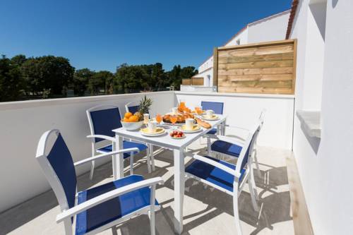 Imagen de la habitación del Hotel Résidence Prestige Odalys Le Domaine Des Pins. Foto 7