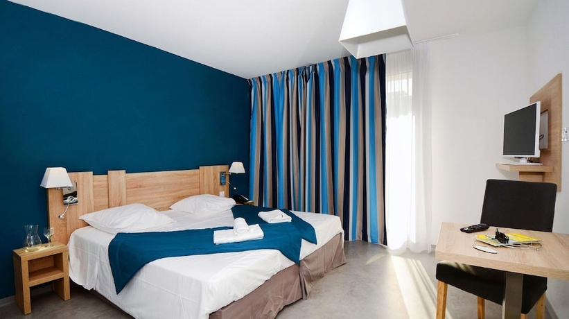 Imagen de la habitación del Hotel R&eacute;sidence Prestige Odalys Nak&acirc;ra. Foto 9