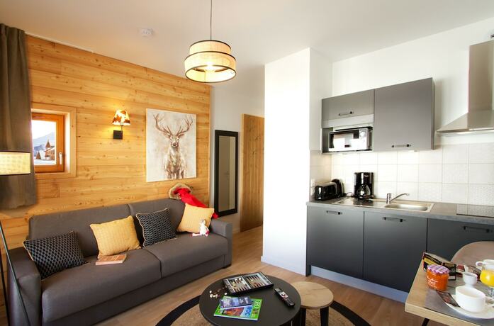 Imagen de la habitación del Hotel Résidence Prestige Odalys Rochebrune Les Cimes. Foto 17