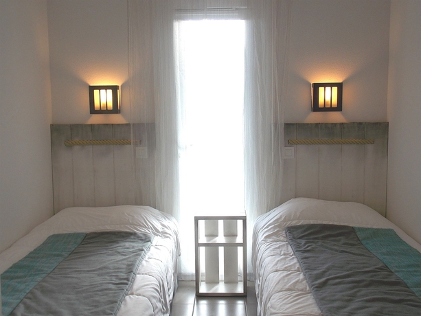 Imagen de la habitación del Hotel Résidence Vacances Bleues Les Jardins D'arvor. Foto 9