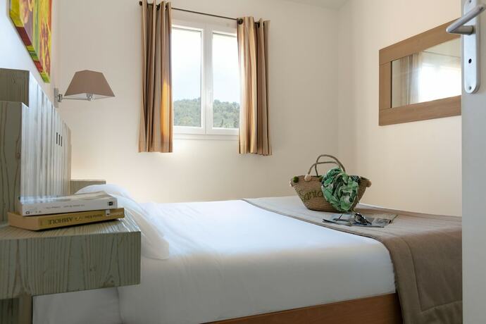 Imagen de la habitación del Hotel R&eacute;sidence Vasca D\'Oro. Foto 11