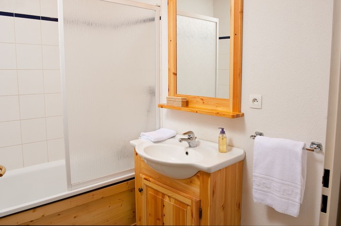Imagen de la habitación del Hotel R&eacute;sidence et Chalets de la Fontaine du roi. Foto 8