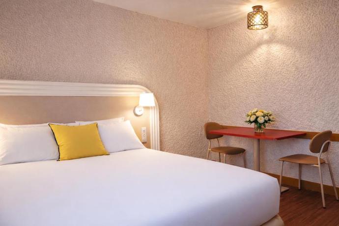 Imagen de la habitación del Hotel R&eacute;sidence les D&ocirc;mes par Vy Resort Thermal & Spa. Foto 7