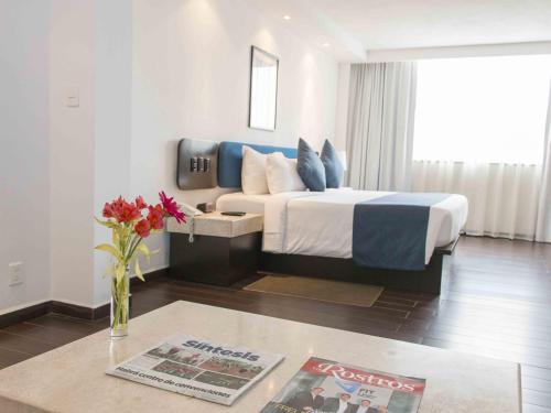 Imagen de la habitación del Hotel Real De Puebla. Foto 7