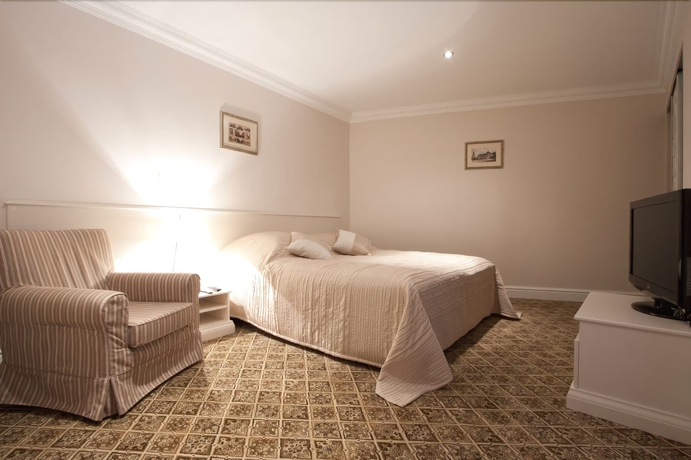 Imagen de la habitación del Hotel Real House. Foto 7