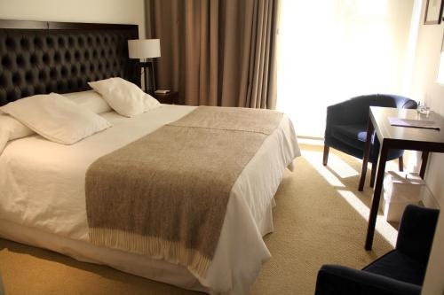 Imagen de la habitación del Hotel Real Lujan. Foto 7