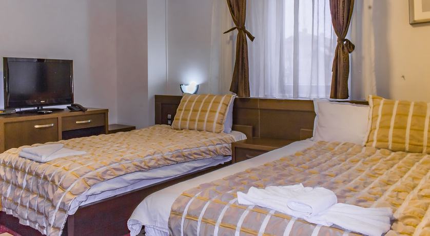 Imagen de la habitación del Hotel Real, Pristina. Foto 20