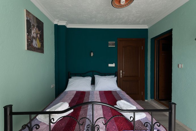 Imagen de la habitación del Hotel Rebetika. Foto 17