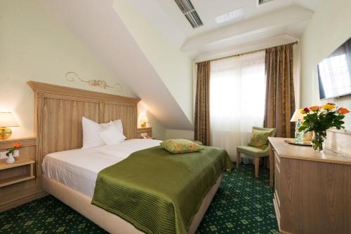 Imagen de la habitación del Hotel Rebstock. Foto 9