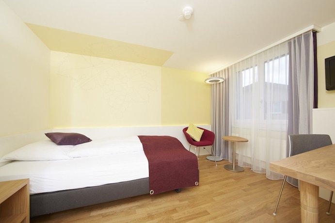 Imagen de la habitación del Hotel Rebstock by b_smart. Foto 10