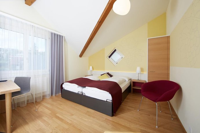 Imagen de la habitación del Hotel Rebstock by b_smart. Foto 13