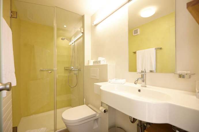 Imagen de la habitación del Hotel Rebstock by b_smart. Foto 20