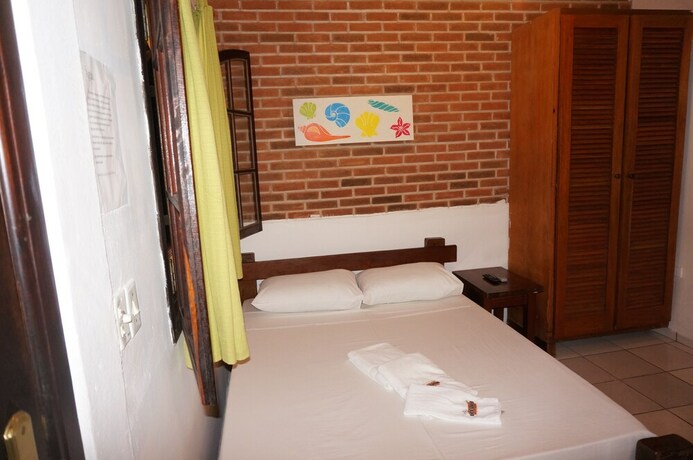 Imagen general del Hotel Recanto Primavera - Camburi. Foto 9
