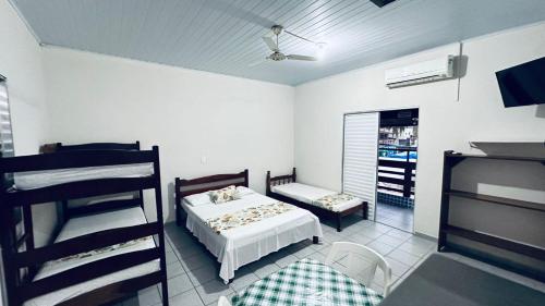 Imagen de la habitación del Hotel Recanto do Tch&ecirc;. Foto 15