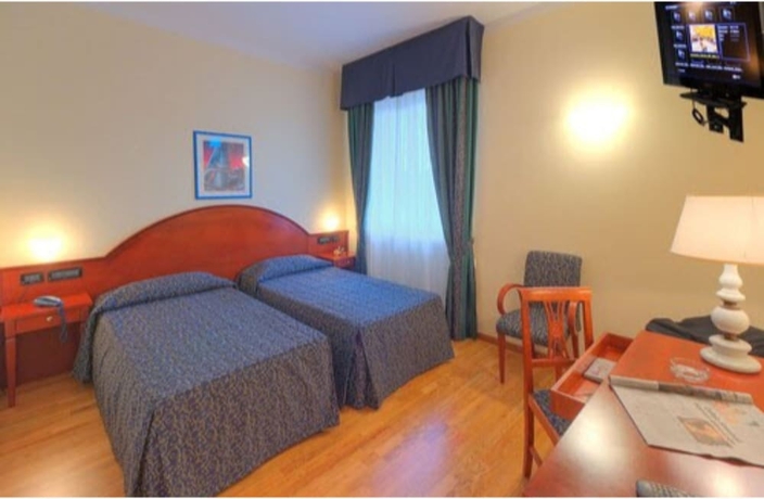 Imagen de la habitación del Hotel Recina. Foto 9