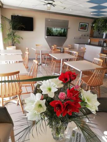 Imagen del bar/restaurante del Hotel R&ecirc;ve De Sable. Foto 4
