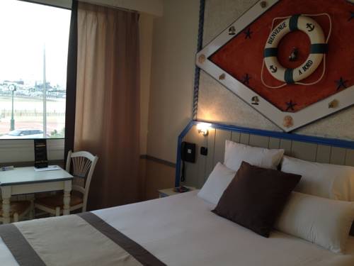 Imagen de la habitación del Hotel R&ecirc;ve De Sable. Foto 14