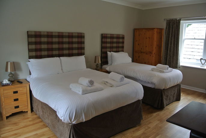 Imagen de la habitación del Hotel Red Brolly Inn. Foto 10