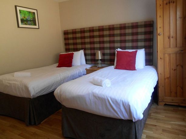 Imagen de la habitación del Hotel Red Brolly Inn. Foto 11