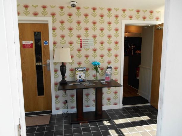 Imagen de la habitación del Hotel Red Brolly Inn. Foto 13