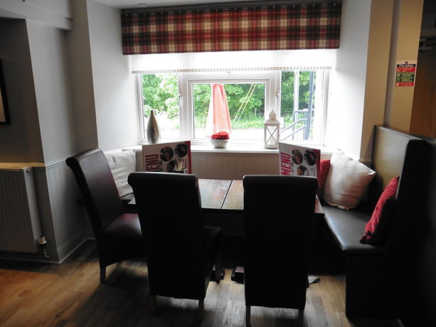 Imagen de la habitación del Hotel Red Brolly Inn. Foto 15