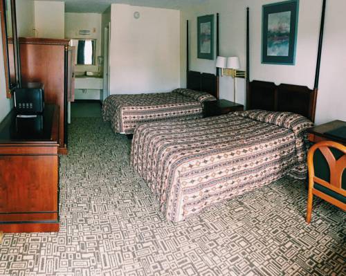 Imagen de la habitación del Hotel Red Carpet Inn, Kissimmee. Foto 4