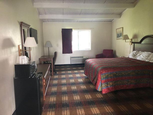 Imagen de la habitación del Hotel Red Carpet Inn North Syracuse. Foto 9