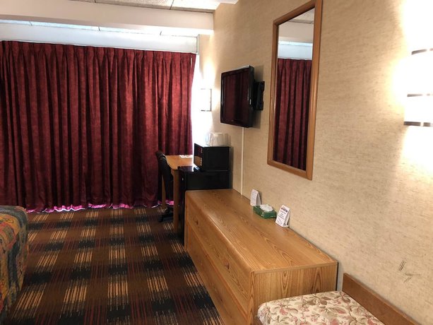 Imagen de la habitación del Hotel Red Carpet Inn North Syracuse. Foto 10