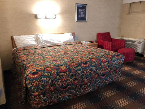 Imagen de la habitación del Hotel Red Carpet Inn North Syracuse. Foto 14