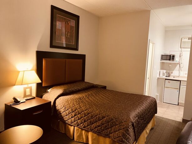 Imagen de la habitación del Hotel Red Carpet Inn and Suites Calgary. Foto 7