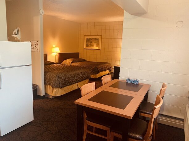 Imagen de la habitación del Hotel Red Carpet Inn and Suites Calgary. Foto 9