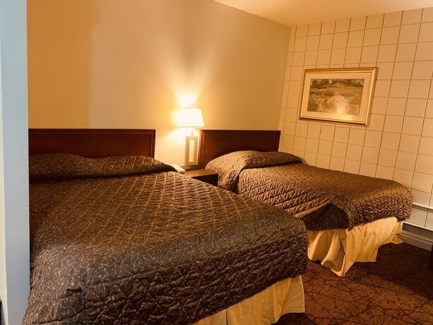 Imagen de la habitación del Hotel Red Carpet Inn and Suites Calgary. Foto 13