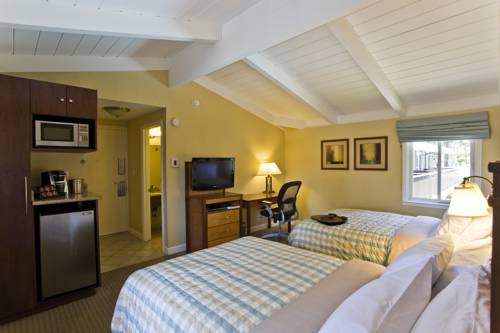 Imagen de la habitación del Hotel Red Cottage Inn. Foto 3