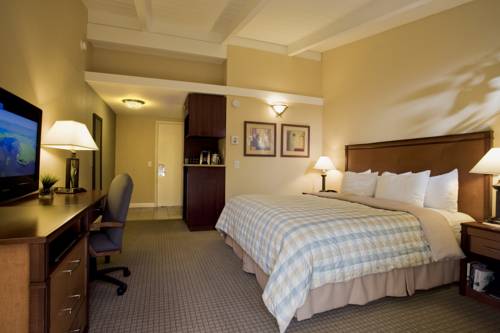 Imagen de la habitación del Hotel Red Cottage Inn. Foto 7