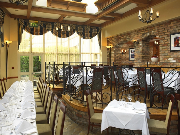 Imagen del bar/restaurante del Hotel Red Cow Moran. Foto 7