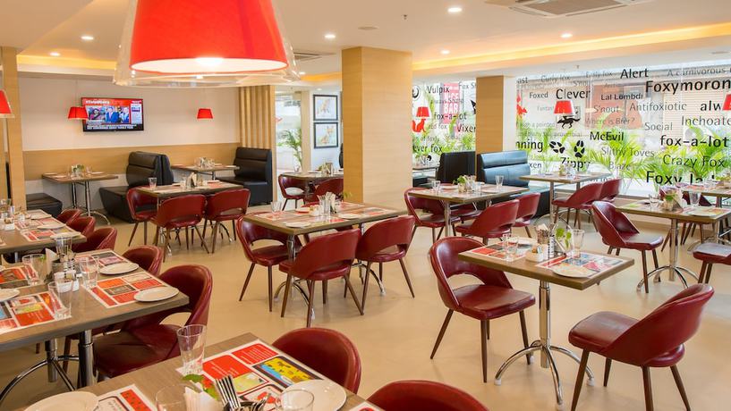 Imagen del bar/restaurante del Hotel Red Fox - Tiruchirappalli. Foto 2