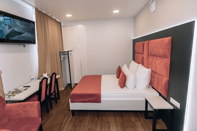 Imagen de la habitación del Hotel Red Fox in the center. Foto 14