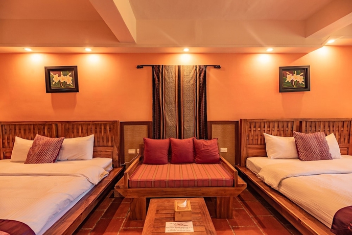 Imagen de la habitación del Hotel Red Garden Resort. Foto 4