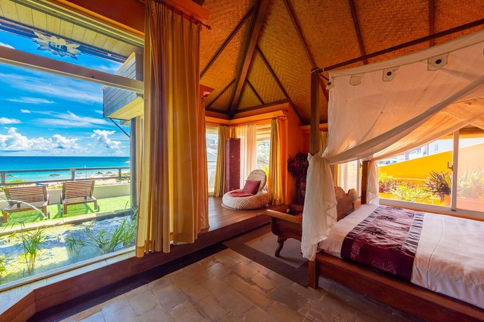 Imagen de la habitación del Hotel Red Garden Resort. Foto 13