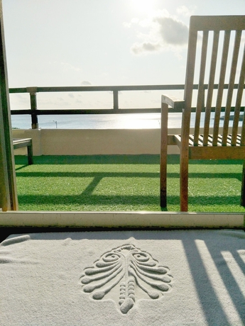 Imagen de la habitación del Hotel Red Garden Resort. Foto 15