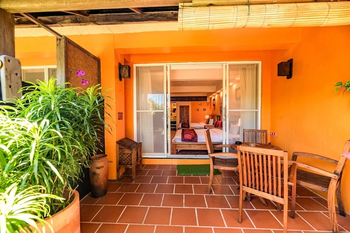 Imagen de la habitación del Hotel Red Garden Resort. Foto 18