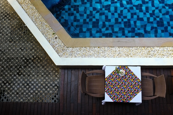 Imagen de la piscina del Hotel Red Ginger Chic Resort. Foto 14