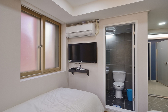 Imagen de la habitación del Hotel Red Guest House. Foto 4