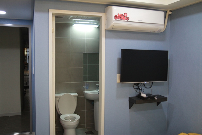 Imagen de la habitación del Hotel Red Guest House. Foto 12
