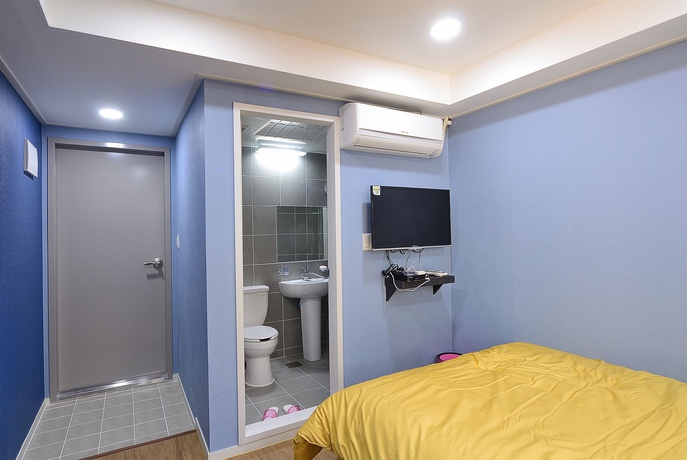 Imagen de la habitación del Hotel Red Guest House. Foto 16
